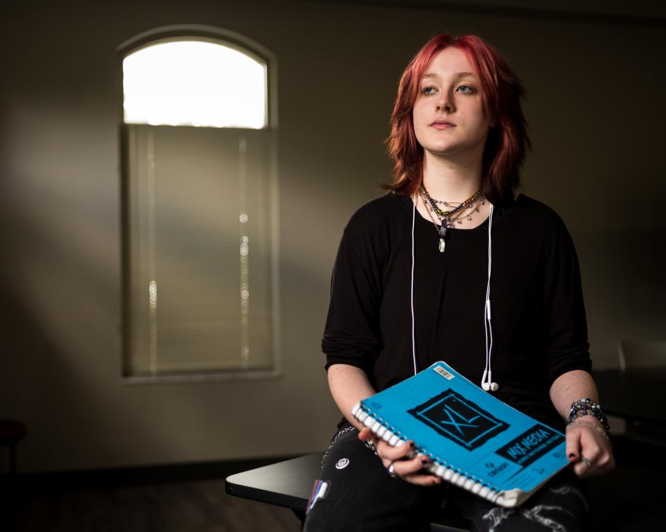 Bee Crowell poses for a portrait in Murfreesboro, Tenn., Thursday, Aug. 10, 2023. Crowell, who faced bullying at school, found refuge in Major Minors, the youth arm of Nashville in Harmony, the region's choir for LGBTQ+ singers and allies.