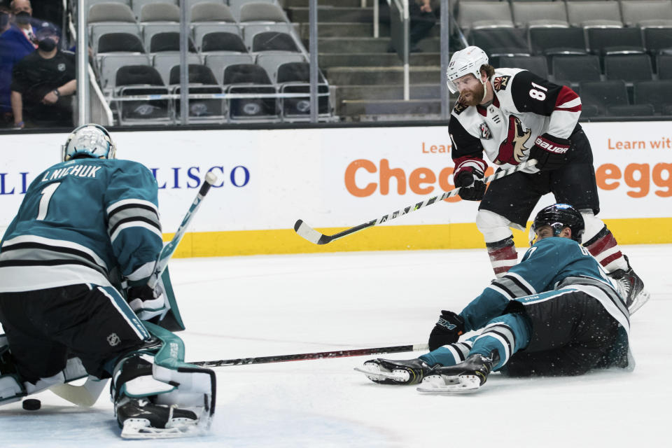 Arizona Coyotes right wing Phil Kessel (81) scores against the San Jose Sharks during overtime in an NHL hockey game in San Jose, Calif., Saturday, May 8, 2021. The Coyotes won 5-4. (AP Photo/John Hefti)