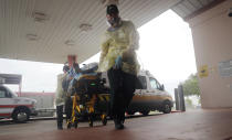 A man arrives at Starr County Memorial Hospital, Tuesday, July 28, 2020, in Rio Grande City, Texas. On America's southern doorstep, the U.S. failure to contain the pandemic has been laid bare. (AP Photo/Eric Gay)