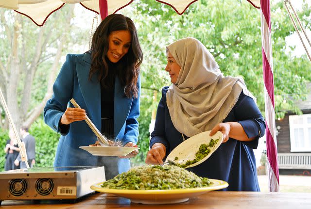 Ben Stansall - WPA/Getty Meghan Markle at the launch of Together: Our Community Cookbook in 2018.