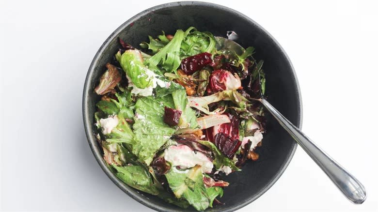 Beet salad in black bowl