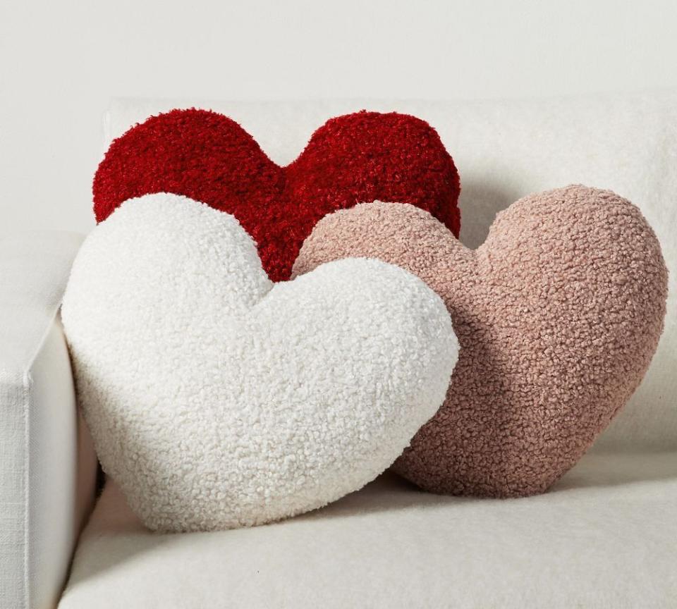 <p><a href="https://go.redirectingat.com?id=74968X1596630&url=https%3A%2F%2Fwww.potterybarn.com%2Fproducts%2Fcozy-teddy-heart-shaped-pillow&sref=https%3A%2F%2Fwww.womansday.com%2Frelationships%2Fdating-marriage%2Fg42024127%2Ffirst-valentines-day-gifts%2F" rel="nofollow noopener" target="_blank" data-ylk="slk:Shop Now;elm:context_link;itc:0;sec:content-canvas" class="link ">Shop Now</a></p><p>Faux Fur Heart Shaped Pillow </p><p>potterybarn.com</p><p>$49.50</p><span class="copyright">Pottery Barn</span>