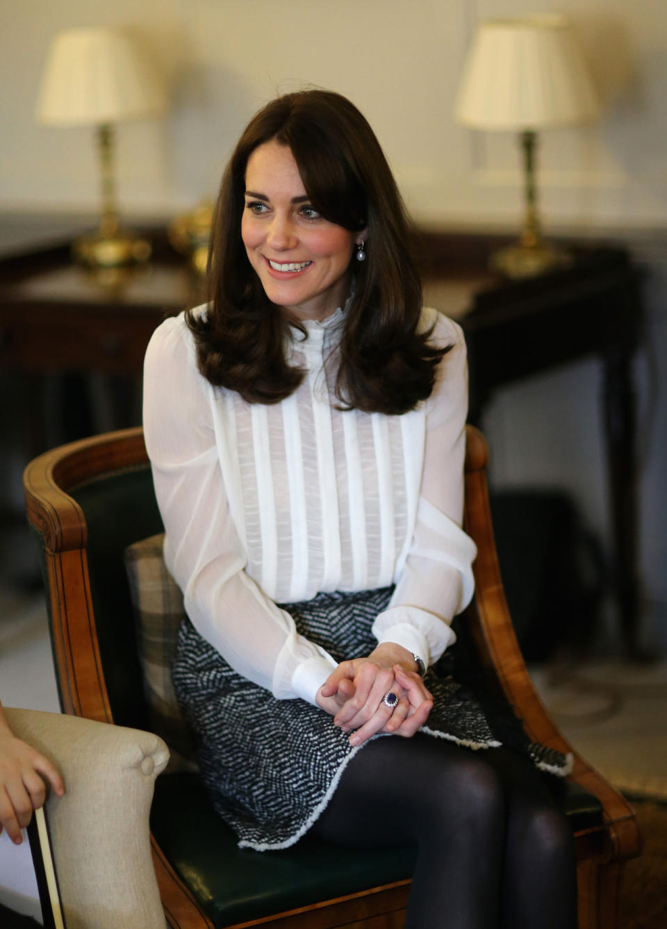 <p>Dressed in a vintage-inspired blouse from Reiss and a boucle wool skirt by Dolce & Gabbana, Kate launched the Young Minds Matter initiative. Black tights and Stuart Weitzman heels finished off the outfit.</p><p><i>[Photo: PA]</i></p>