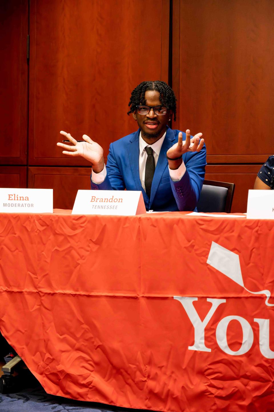 Brandon Washington discussing foster care issues on a panel in the U.S. Capitol.