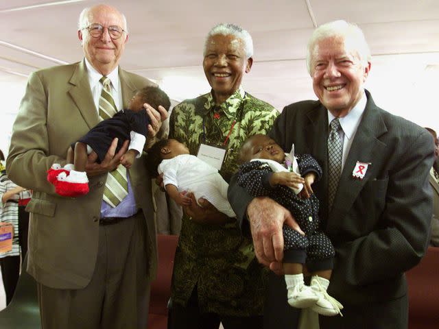 <p>Jeff Christensen/WireImage</p> Bill Gates Sr., former South African President Nelson Mandela and former U.S. President Jimmy Carter at the Zola clinic in South Africa on March 7, 2002.