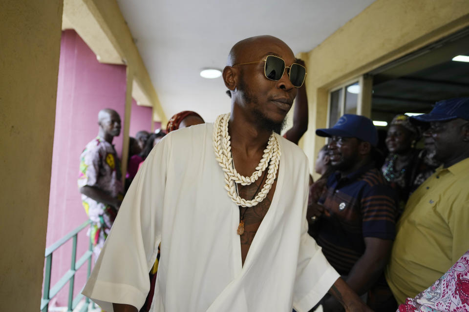 Afrobeat star, Seun Kuti, walks out of the Magistrate court room after he was granted bail by a judge in Lagos, Nigeria, Wednesday, May 24, 2023. Kuti who is facing trial on charges of assaulting a police officer will embark on a delayed concert tour after being released on bail, his manager said Wednesday. (AP Photo/Sunday Alamba)