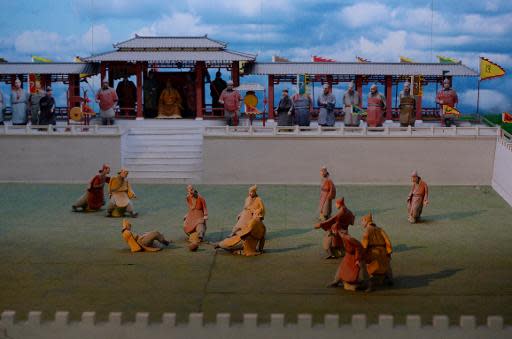 Una réplica en miniatura de como sería un partido de 'Cuju' es fotografiada en el Museo de Fútbol de Linzi en la ciudad china de Zibo, el 15 de mayo de 2014 (AFP/Archivos | Mark Ralston)