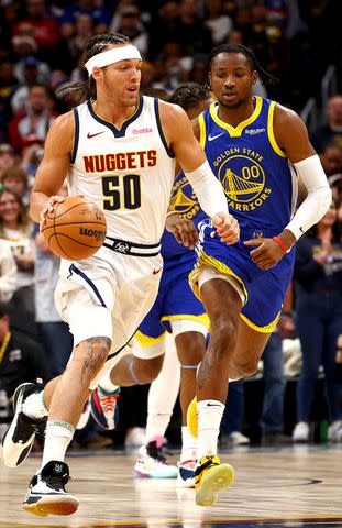 <p>Jamie Schwaberow/Getty</p> Aaron Gordon is seen playing during the Denver Nuggets' Christmas Day game against the Golden State Warriors.