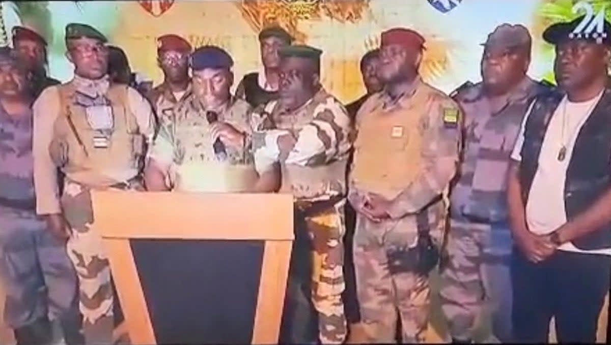 This video grab taken from Gabon 24 shows Gabonese soldiers appearing on television on 30 August 2023 announcing take over of power from president Ali Bongo (Gabon 24/AFP via Getty Images)