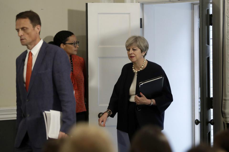 Britain's Prime Minister Theresa May (R) arrives with RSA Chief Executive Matthew Taylor (L) to deliver a speech on modern working practices at the RSA (Royal Society for the encouragement of Arts, Manufactures and Commerce) in London, on July 11, 2017. A weakened Theresa May came under fresh pressure Tuesday to soften her Brexit position, adding to uncertainty about her negotiating strategy with Brussels one year after she became Britain's leader. / AFP PHOTO / POOL / Matt Dunham        (Photo credit should read MATT DUNHAM/AFP via Getty Images)