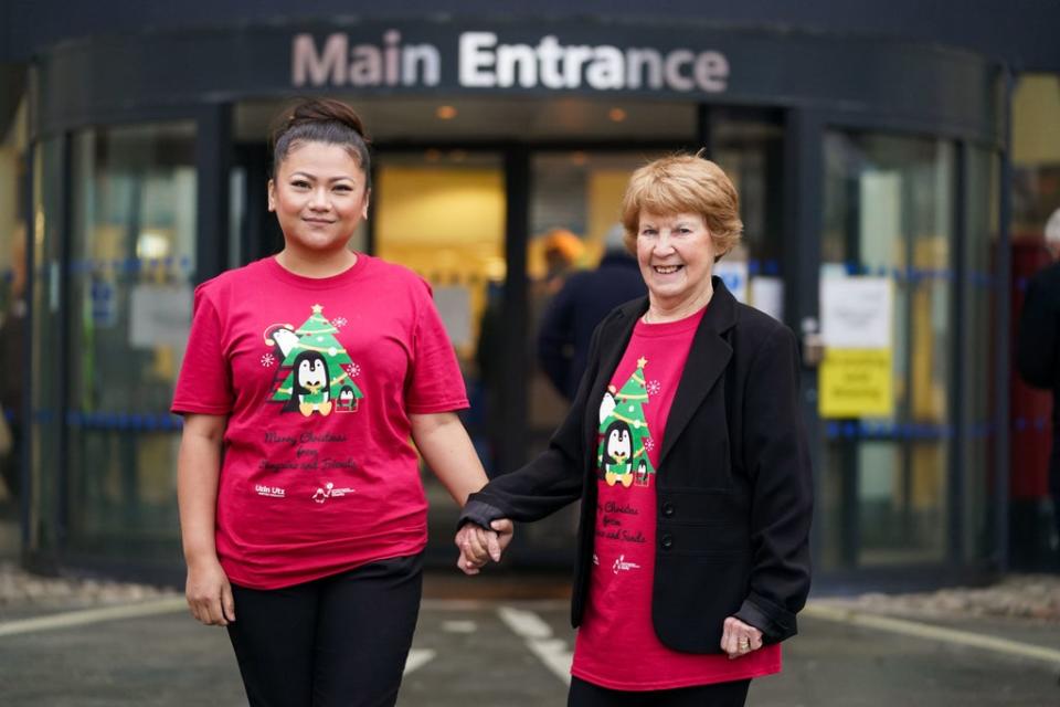 Margaret Keenan (right) and Nurse May Parsons at University Hospital Coventry & Warwickshire on Wednesday  (PA)