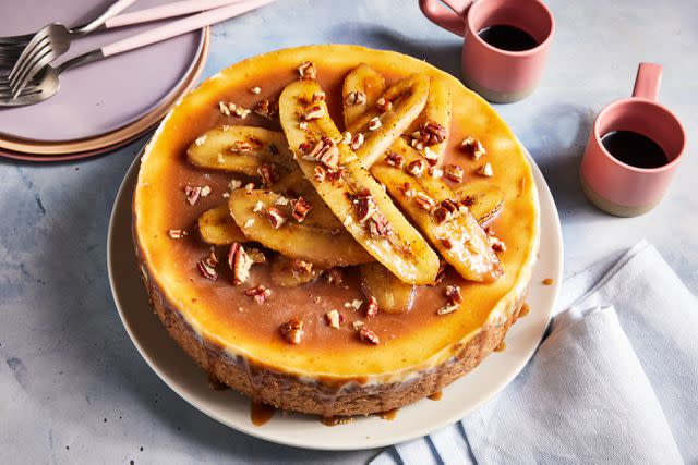 <p>Jennifer Causey / Food Styling by Ali Ramee / Prop Styling by Christina Daley</p> Bananas Foster Cheesecake