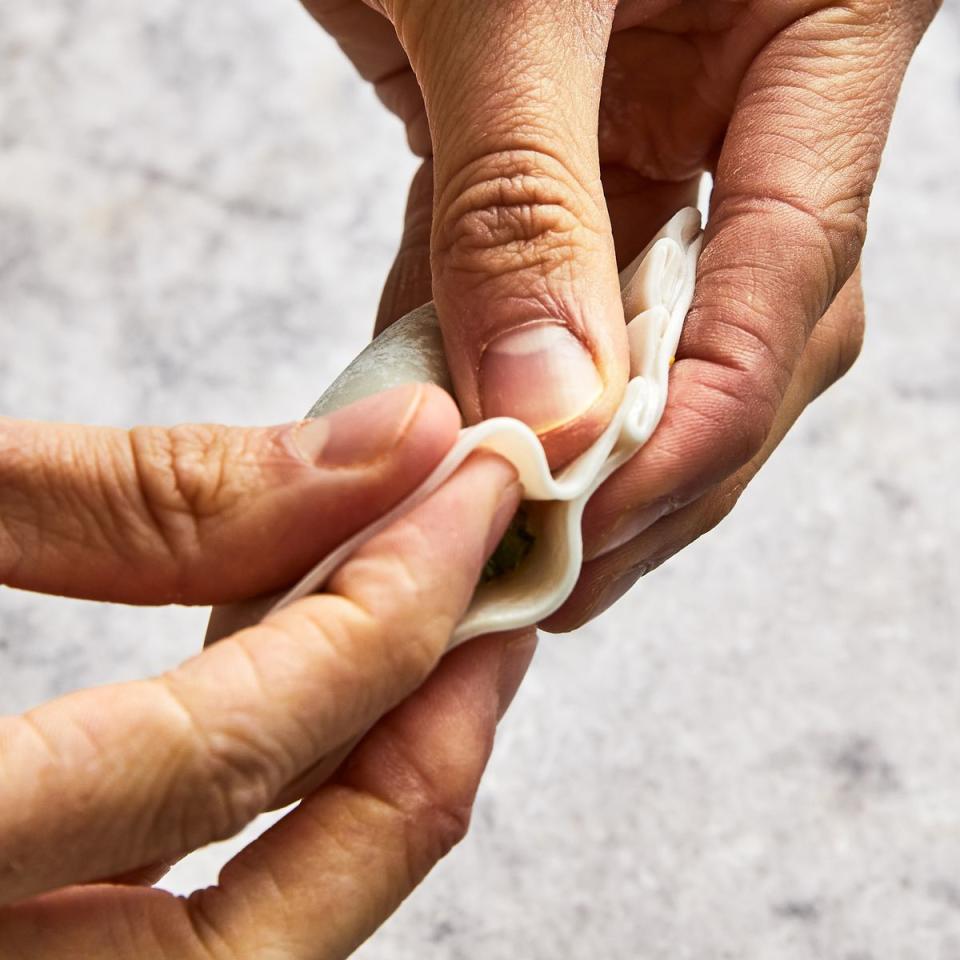 folding handmade dumplings