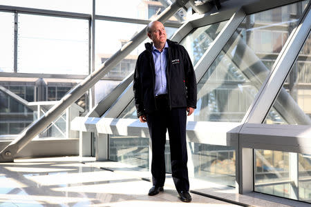 FILE PHOTO: Rupert Soames, CEO of Serco Group, poses for a photograph at their offices in London, Britain, July 3, 2018. REUTERS/Simon Dawson/File Photo