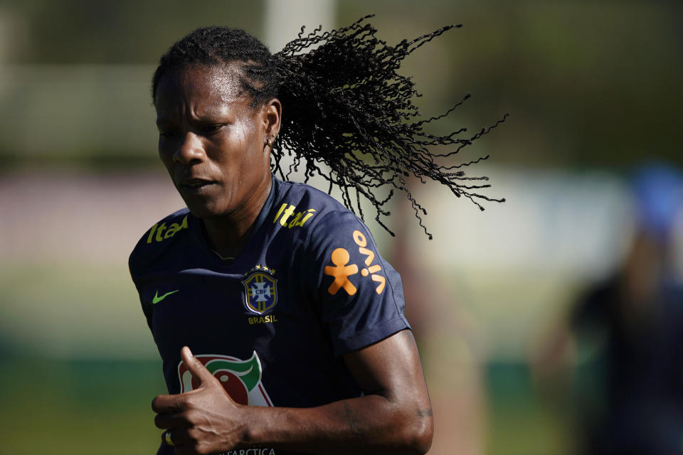 FILE - Brazil's Formiga runs during a practice session of the Brazilian national soccer team in preparation for the women's World Cup in France, at the Granja Comary training center in Teresopolis, Brazil, Jan. 22, 2019. After competing in seven World Cups, 43-year-old midfielder Formiga is set to play her farewell match for Brazil this month. Formiga’s final game for the national team will be against India on Nov. 25 in Manaus. The country's soccer confederation made the announcement on Tuesday, Nov. 9, 2021. Formiga has played 233 matches for Brazil including at every Olympics since Atlanta in 1996. (AP Photo/Leo Correa, File)