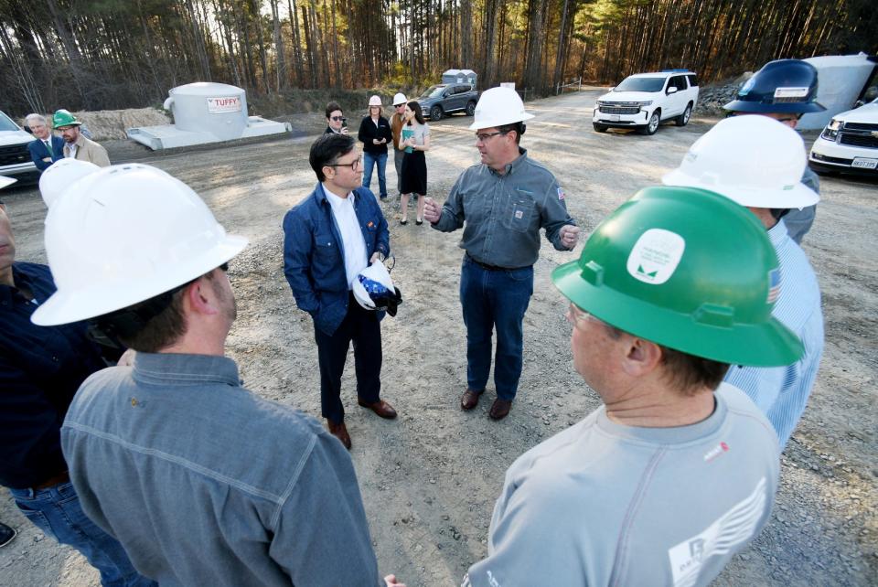 Speaker of the House Mike Johnson talks to Chesapeake Energy CEO and President Nick Dell'Osso at a natural gas rig in Mansfield, La., Friday morning, Feb. 23, 2024.