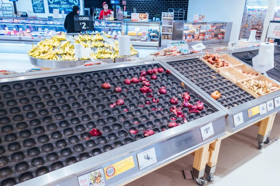 Empty fresh produce aisle at Coles supermarket