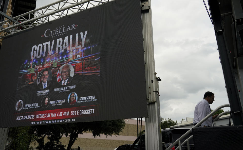 U.S. Rep. Henry Cuellar, D-Laredo, walks to the stage during a campaign event, Wednesday, May 4, 2022, in San Antonio. Cuellar, a 17-year incumbent and one of the last anti-abortion Democrats in Congress, is in his toughest reelection campaign, facing a May 24 primary runoff against progressive Jessica Cisneros. (AP Photo/Eric Gay)