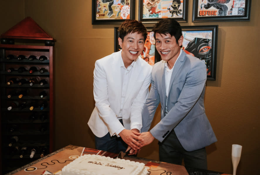 Goh (left) and his husband at their wedding reception. (Photo: Caleb Goh/Twitter)