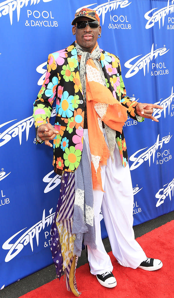 <b>Who:</b> Dennis Rodman<br><br> <b>Wearing:</b> A psychedelic blazer and an eyesore-inducing scarf<br><br> <b>Where:</b> Sapphire Pool & Day Club grand opening in Las Vegas