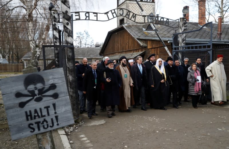 Mohammad Al-Issa, Secretary General of the Muslim World League and David Harris, CEO of the American Jewish Committee, visit the former Nazi German concentration and extermination camp Auschwitz I in Oswiecim