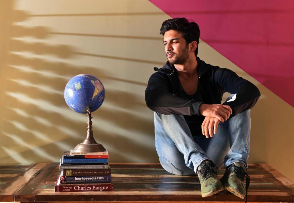 MUMBAI, INDIA - DECEMBER 26: (EDITOR’S NOTE: This is an exclusive image of Hindustan Times) Bollywood actor Sushant Singh Rajput poses during an exclusive interview with HT Cafe-Hindustan Times, at his residence at Bandra, on December 26, 2016 in Mumbai, India. During the interview, he said, "As an actor, I often work in self-interest. The way people like playing games, watching movies, I love acting. So, all I was concerned about was the experience of working with Neeraj (Pandey) and the process of knowing and becoming Dhoni. The commerce is for the producers to handle and fame for my PR agency (smiles)." (Photo by Pratham Gokhale/Hindustan Times via Getty Images)