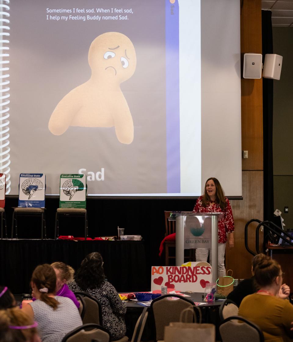 Staff members for Encompass Early Education and Care learn about conscious discipline from instructor Kay Zastrow during an professional development day.