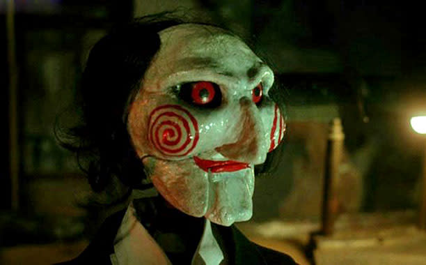 The Jigsaw Killer’s puppet avatar from the <em>Saw </em>movies (Image: Lionsgate)