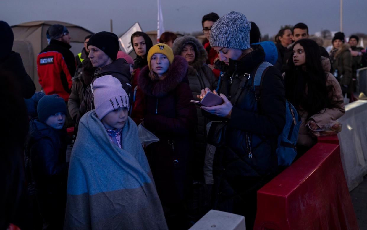 Ukraine refugees fleeing war uk sponsor scheme - Petros Giannakouris/AP Photo