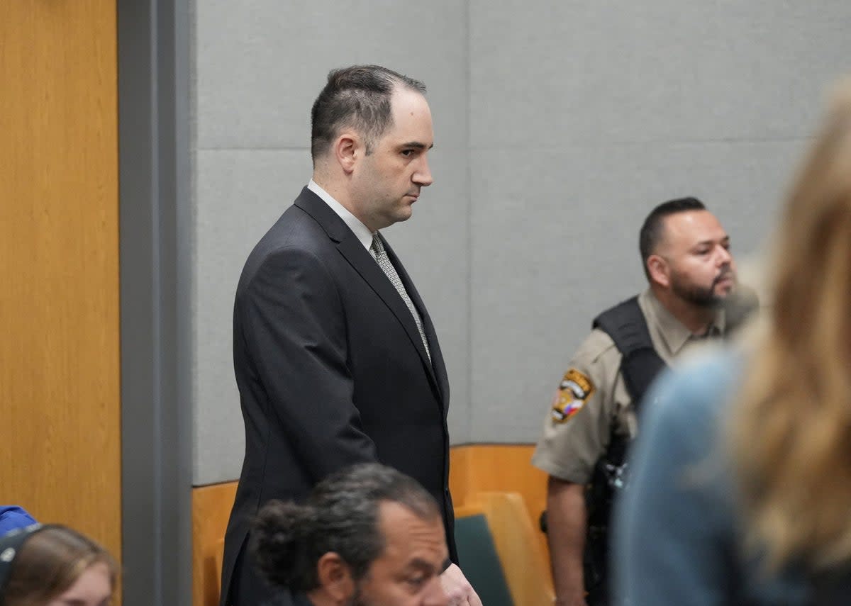 Daniel Perry walks into the courtroom moments before he was convicted of murder in the July 2020 shooting death of Garrett Foster at a Black Lives Matter protest (via REUTERS)