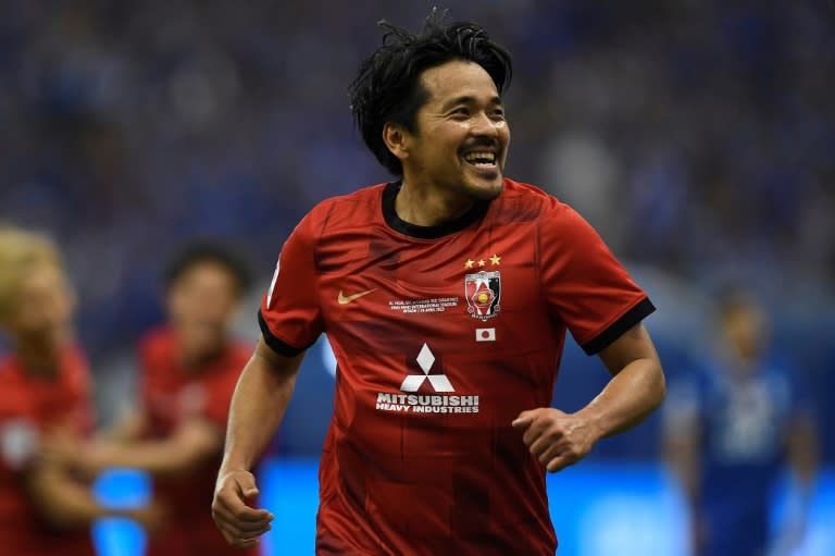 On target: Urawa forward Shinzo Koroki celebrates scoring