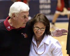 Texas Tech coach Bob Knight (left) walks off the court with his wife, Karen, after the Red Raiders 71-69 win over Gonzaga in the second round of the NCAA Tournament at the McKale Center in Tucson, Ariz., Saturday. Knight is back in the Sweet 16 for the first time since 1994. AP Photo