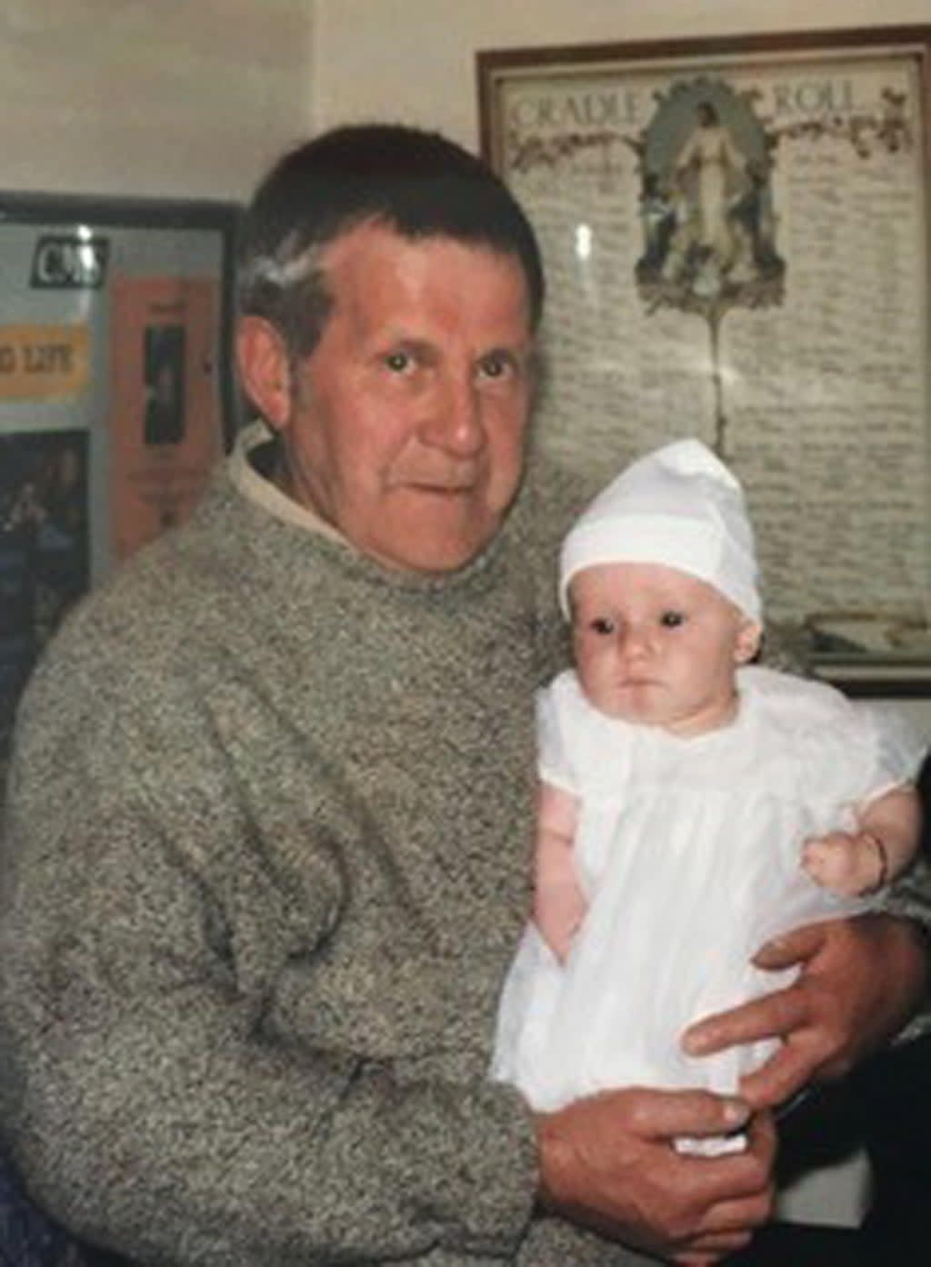 Frank Fishwick, holding one of grandchildren, who died in hospital on Saturday morning after the Army veteran was assaulted outside his home in Preston (Lancashire Police/PA) (PA Media)