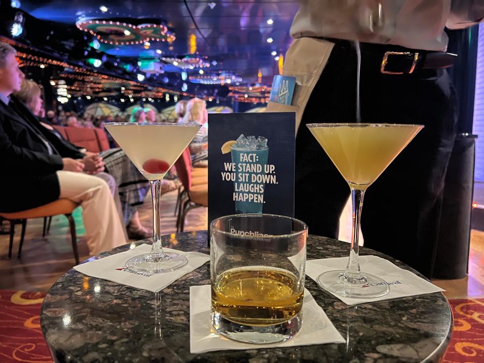 Server pouring cocktails in the comedy club carnival pride