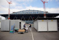 Workers are seen at the construction site of the Ariake Gymnastics Centre for Tokyo 2020 Olympic and Paralympic games in Tokyo, Japan February 12, 2019. REUTERS/Issei Kato