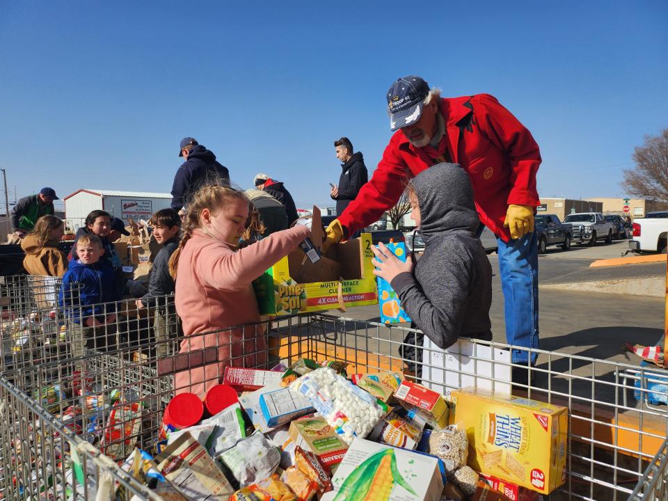 Boy Scout troops deliver food donations to the High Plains Food Bank Distribution Center on Saturday morning during their 2023 Scouting for Food event.