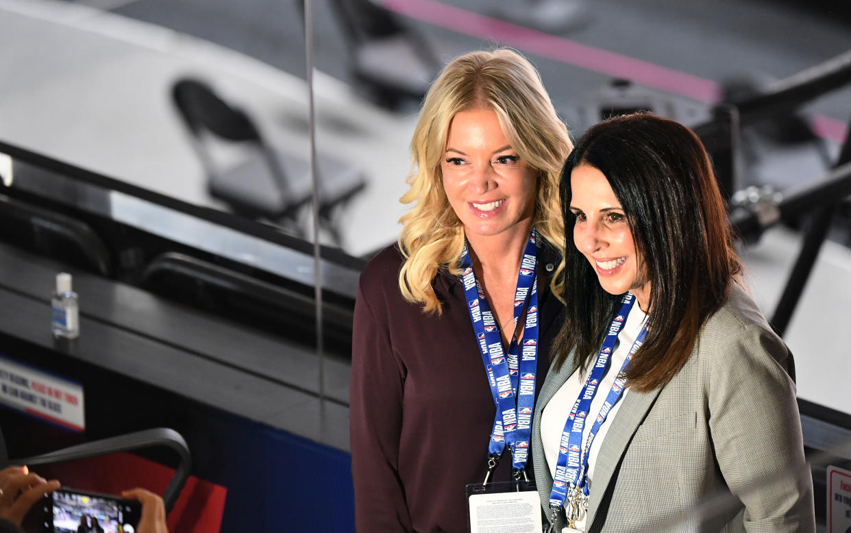 ORLANDO, FLORIDA OCTOBER 2, 2020- Lakers owner Jeannie Buss and Linda Rambis take a photo together before Game 2 of the NBA FInals in Orlando Friday. (Wally Skalij/Los Angeles Times via Getty Images)