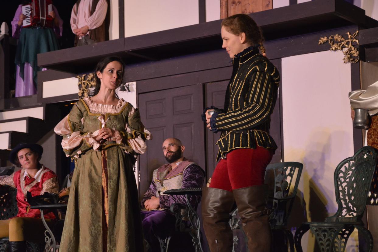 Natalie Green, left, and Tess Burgler star as Katarina and Petruchio in Ohio Shakespeare Festival's "The Taming of the Shrew" at Stan Hywet Hall & Gardens.