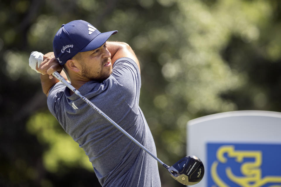 Xander Schauffele, watches his drive off the third tee during the final round of the RBC Heritage golf tournament, Sunday, April 16, 2023, in Hilton Head Island, S.C. (AP Photo/Stephen B. Morton)