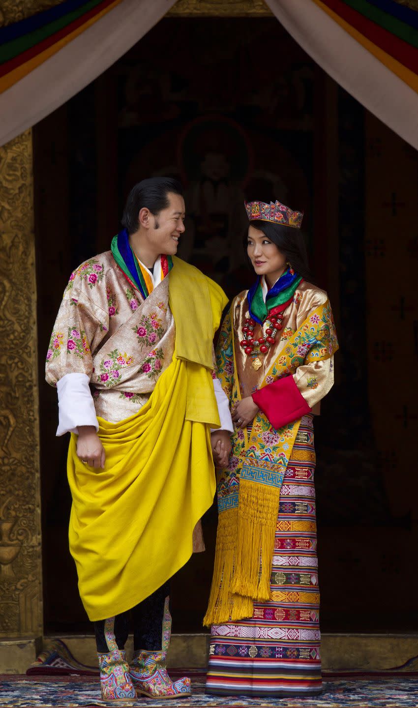 <p>The Queen of Bhutan was married in a colorful Bhutanese kira, one of several that she wore during her <a href="https://www.washingtonpost.com/world/bhutans-royal-wedding/2011/10/12/gIQApfCkfL_gallery.html?utm_term=.ea52b2ff75f5" rel="nofollow noopener" target="_blank" data-ylk="slk:three day wedding celebration;elm:context_link;itc:0;sec:content-canvas" class="link ">three day wedding celebration</a>.</p>