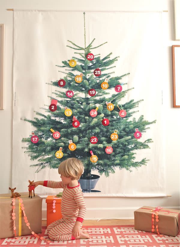 <p>If there's anyone more excited for Christmas than you, it's your kids. Share this special moment by crafting this larger-than-life felt advent calendar. </p><p><em><a href="http://ohhappyday.com/2012/11/giant-advent-calendar-diy/" rel="nofollow noopener" target="_blank" data-ylk="slk:See more at Oh Happy Day »" class="link ">See more at Oh Happy Day »</a></em></p>