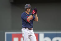 Minnesota Twins Alex Kirilloff celebrates after hitting a two-run double off Chicago White Sox pitcher Michael Kopech during the first inning of a baseball game, Friday, July 15, 2022, in Minneapolis. (AP Photo/Craig Lassig)