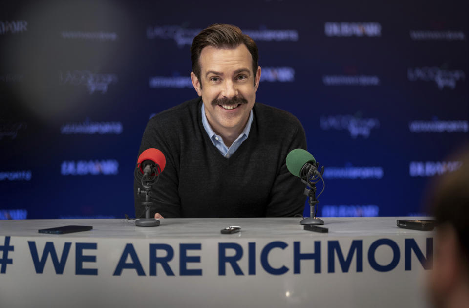 This image released by Apple TV+ shows Jason Sudeikis in a scene from "Ted Lasso." Sudeikis was nominated for an Emmy Award for best lead actor in a comedy series. (Colin Hutton/Apple TV+ via AP)