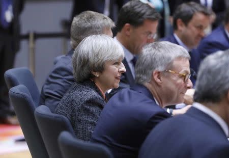 British Prime Minister Theresa May seated at the conference table during the EU summit in Brussels, Belgium, March 9, 2017. REUTERS/Yves Herman