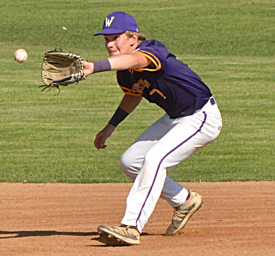 Watertown Post 17 second baseman Treyton Himmerich charges in to field a high hop and start a double play during an American Legion Baseball doubleheader against Groton Area on Tuesday, May 30, 2023 in Watertown.