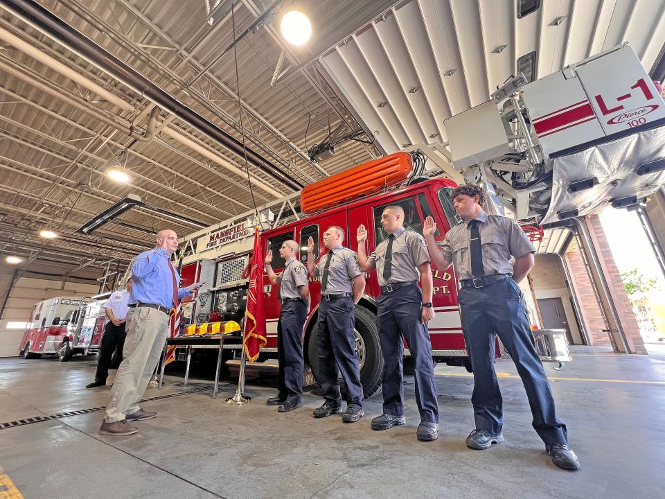 New Mansfield firefighters Caden Boebel, Lawrence Firmi, Logan Haas and Rocky Sword were sworn-in Monday morning by Mansfield Safety-Service Director Keith Porch.