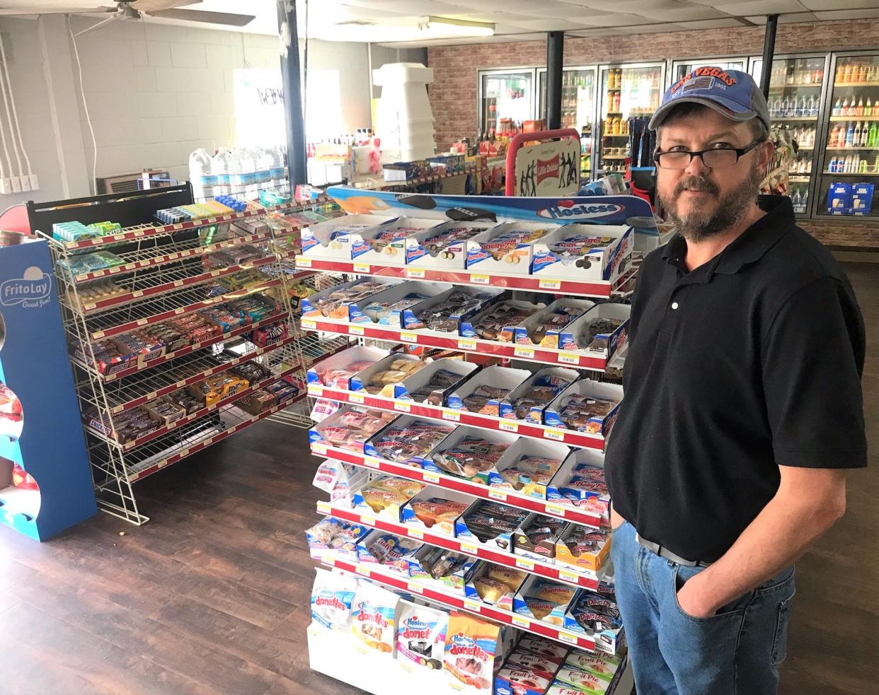 Scott Veal, owner of Scott's Place in Gibson and Wrens and Lil' Dutch Bakery in Louisville, stands in his newest business, Rocket Food and Fuel in Mitchell.