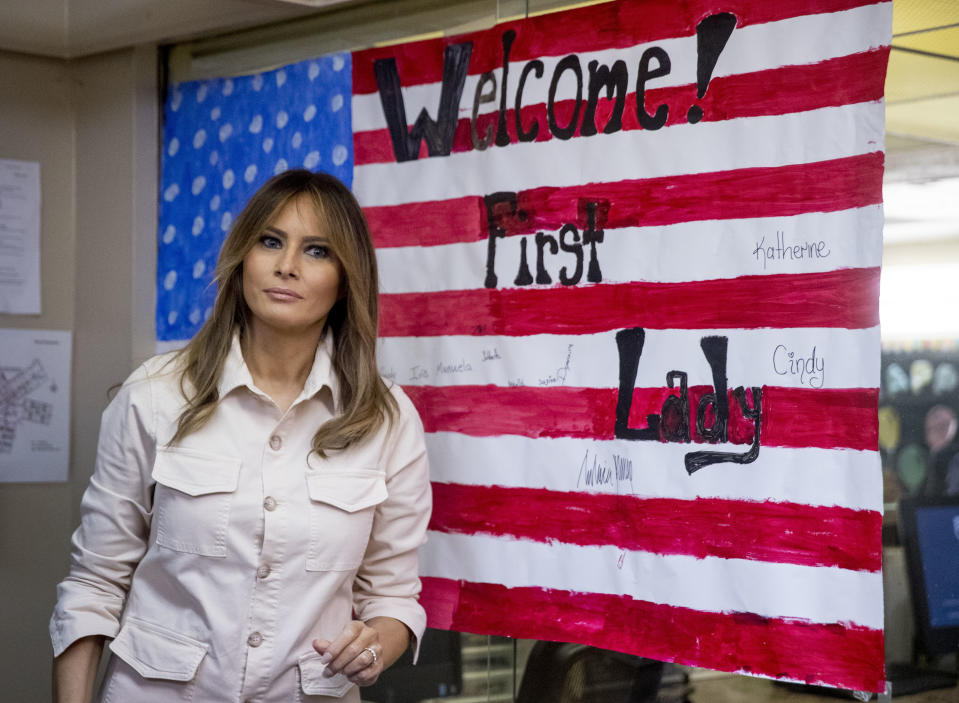 <p>First lady Melania Trump pauses after signing an artwork of an American flag while visiting the Upbring New Hope Children Center run by the Lutheran Social Services of the South in McAllen, Texas, Thursday, June 21, 2018. (Photo: Andrew Harnik/AP) </p>