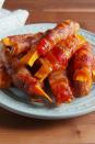 <p>We're ruined for regular fries.</p><p>Get the recipe from <a href="https://www.delish.com/cooking/recipe-ideas/recipes/a49759/bacon-wrapped-sweet-potato-fries-recipe/" rel="nofollow noopener" target="_blank" data-ylk="slk:Delish;elm:context_link;itc:0;sec:content-canvas" class="link ">Delish</a>.</p>