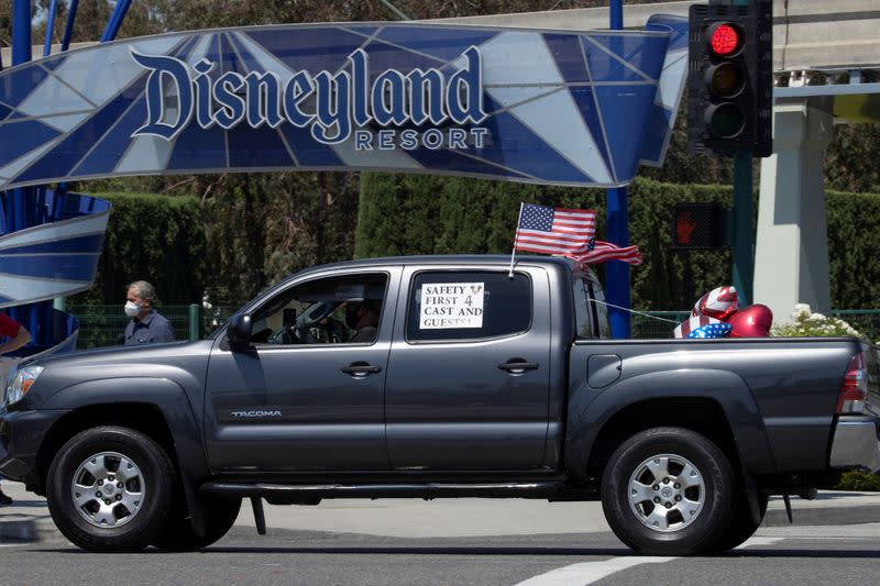 Disney cast members stage a car caravan outside Disneyland California, calling for higher safety standards for Disneyland to reopen